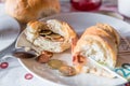 breakfast table with coffee sugar milk and butter and roll covered with euro coins and banknotes on plate, Germany Royalty Free Stock Photo