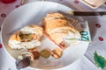 breakfast table with coffee sugar milk and butter and roll covered with euro coins and banknotes on plate, Germany Royalty Free Stock Photo