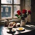 a breakfast table , a cup of coffee, a bread,red roses in a bottle - 1 Royalty Free Stock Photo