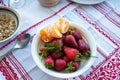 Breakfast on the table, juice, cereal and fruits in the sun. Goo Royalty Free Stock Photo