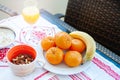 Breakfast on the table, juice, cereal and fruits in the sun. Goo Royalty Free Stock Photo