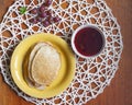 Breakfast on the table on a napkin, pancakes in a plate Royalty Free Stock Photo