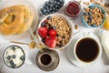 Breakfast table with oatmeal, croissants Royalty Free Stock Photo