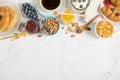 Breakfast table with oatmeal, croissants Royalty Free Stock Photo