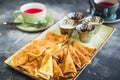 Breakfast on the table with pancakes, sour cream, honey, jam