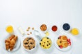 Breakfast table setting with flakes, juice, croissants, pancakes Royalty Free Stock Photo