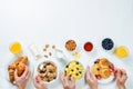 Breakfast table setting with flakes, juice, croissants, pancakes Royalty Free Stock Photo