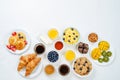 Breakfast table setting with flakes, juice, croissants, pancakes Royalty Free Stock Photo