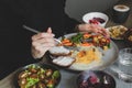 Girl eat food.Breakfast at the table Royalty Free Stock Photo