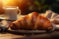 Breakfast tableau Croissant and cup on table with bokeh morning