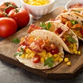 Breakfast tacos with scrambled eggs and bacon