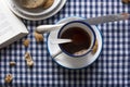 Breakfast tea, blue checkered tablecloth