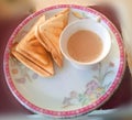 Breakfast tea with sandwiches Asian Indian Pakistani meal snacks bread