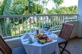 breakfast on their balcony of an appartment luxury hotel condo in Mauritius Royalty Free Stock Photo