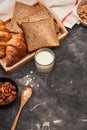 Breakfast with toast and croissant. milk in a glass bottle. Good start to the day. Good morning Royalty Free Stock Photo