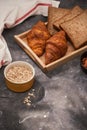 Breakfast with toast and croissant. milk in a glass bottle. Good start to the day. Good morning Royalty Free Stock Photo