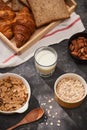 Breakfast with toast and croissant. milk in a glass bottle. Good start to the day. Good morning