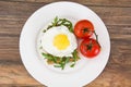 Breakfast toast with fried egg and arugula Royalty Free Stock Photo