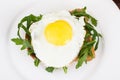 Breakfast toast with fried egg and arugula Royalty Free Stock Photo