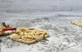 Breakfast with toaster and oat bread, buttered with butter, jam, strawberries and bananas on a concrete table. Royalty Free Stock Photo