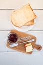 Breakfast: toasts, butter, raspberry jam