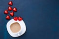 Breakfast at Valentine`s Day. Cup of coffee with heart shaped ch Royalty Free Stock Photo