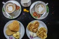 Breakfast on Valentine`s Day - fried omelete, bread, apple and White cheese in the shape of a heart coffe and milk. Top view Royalty Free Stock Photo