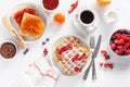 Breakfast with waffle, toast, berry, jam, chocolate spread and c Royalty Free Stock Photo