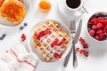 Breakfast with waffle, toast, berry, jam and coffee. Top view Royalty Free Stock Photo