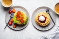 Breakfast with waffles and coffee, top view. Different toppings for sandwiches - ice cream and vegetables Royalty Free Stock Photo