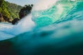 Breaking barrel wave in ocean. Blue wave in Bali, Padang Padang Royalty Free Stock Photo