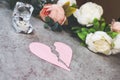 Breaking up relationship and canceling wedding. broken heart next to ring. Royalty Free Stock Photo