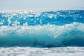 Breaking Wave of Blue Ocean on sandy beach Summer Background Royalty Free Stock Photo