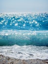 Breaking Wave of Blue Ocean on sandy beach Summer Background Royalty Free Stock Photo