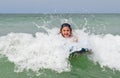 Breaking Through the Wave on a Boogie Board Royalty Free Stock Photo