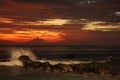 Breaking wave hit the rocks at the sunset Royalty Free Stock Photo