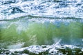 Breaking waves of clear green water Royalty Free Stock Photo