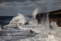 Breaking waves over Holyhead Breakwater Royalty Free Stock Photo