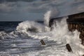 Breaking waves over Holyhead Breakwater Royalty Free Stock Photo
