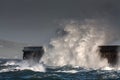 Breaking waves over Holyhead Breakwater Royalty Free Stock Photo