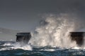 Breaking waves over Holyhead Breakwater