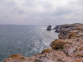 Breaking waves on the rocky coast of the Black Sea Royalty Free Stock Photo