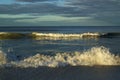 Breaking waves at sunrise gulf of mexico