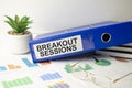 BREAKOUT SESSION text on notebook with charts and pen, business Royalty Free Stock Photo