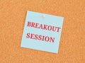 Breakout Sessions on light blue sticky note pined on a cork bulletin board