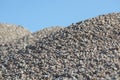 Breakstone background. Road gravel. Gravel texture. Crushed Gravel. Piles of limestone rocks. Break stones on construction site.