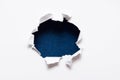 Breakthrough paper hole Royalty Free Stock Photo