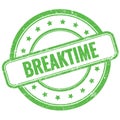 BREAKTIME text on green grungy round rubber stamp