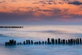 Breakwater at beautiful sunset, Baltic Sea Royalty Free Stock Photo