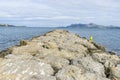 Breakwater by the Mediterranean sea on the island of Ibiza in Sp Royalty Free Stock Photo